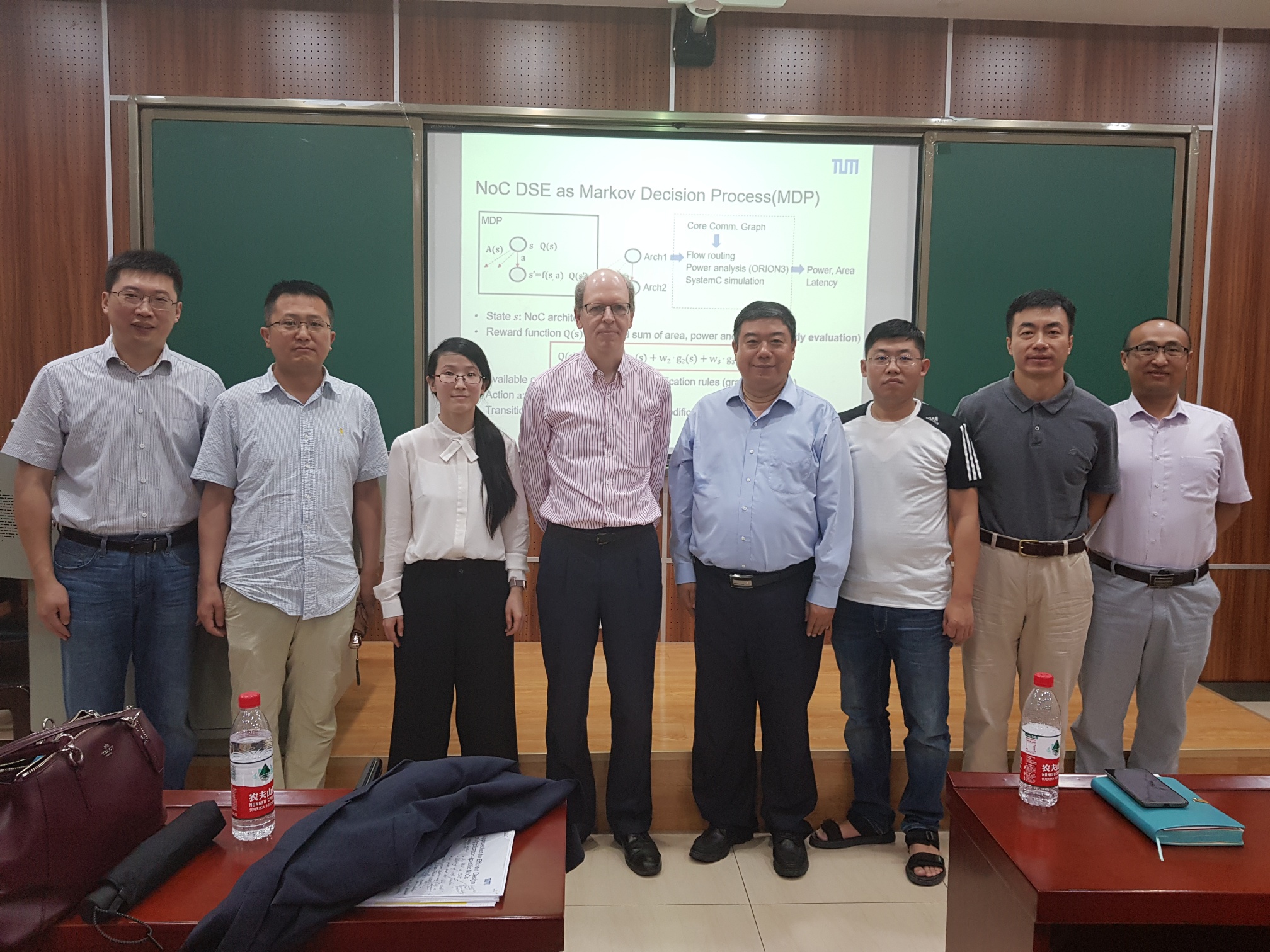 The photo shows Li Zhang and Ulf Schlichtmann together with Prof. Yintang Yang, Vice President of Xidian University, with some of his colleagues.